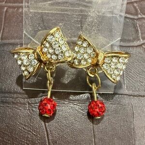 Elegant Gold Bow Earrings with Red Accents